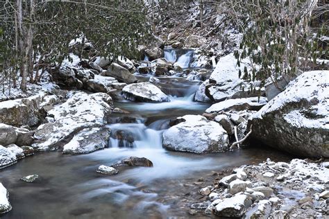 Of course the most popular thing to do in the blue ridge mountains during the winter is skiing and snowboarding. Blue Ridge Mountain Stream Snow Photograph by Ryan Phillips