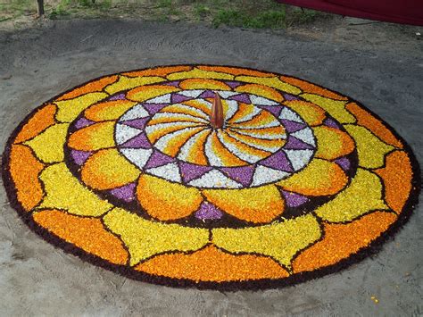 Athapookalam or onam pookalam is typically made by girls and women by laying out a pookalam design on the floor. India Onam - All World Events