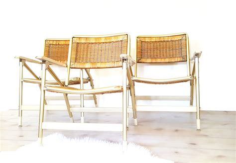 This light brown mix and match folding wicker patio chair will offer seamless quality and stylish portability in your patio space. Three Folding Chairs ~ Mid Century Telescope Folding ...