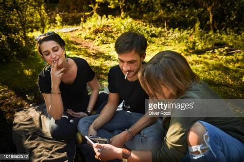 Smoking Cigarettes Friends Photos And Premium High Res Pictures Getty