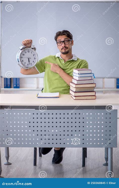 Young Male Student In Time Management Concept Stock Image Image Of