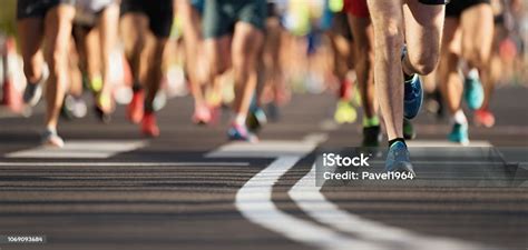 Marathon Running Race People Feet On City Road Stock Photo Download