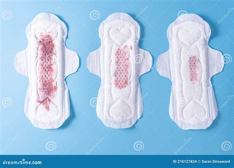 set of different used sanitary pad sanitary napkin on blue background menstruation feminine