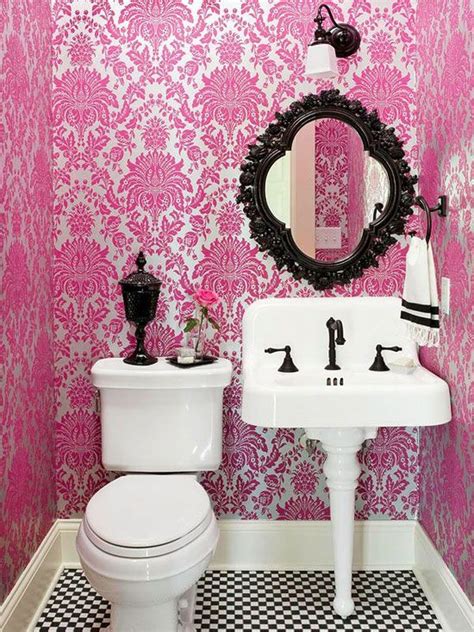 A pink painted statement wall to add a splash of color to a a combo of glossy pink long narrow tiles and a matte black cabinet over them for a chic modern look. 30 Bathroom Color Schemes You Never Knew You Wanted