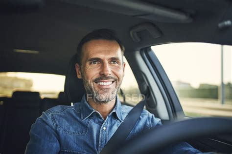 Handsome Man Driving A Car — Mid Adult Men Shirt Stock Photo