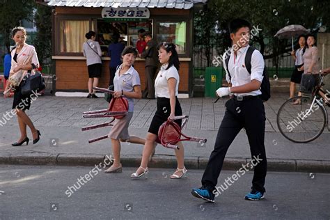 North korean authorities continue to highlight the achievement of the country's economic goals, but the lack of raw materials is causing serious disruptions to. North Korean women carry stools on streets Editorial Stock ...