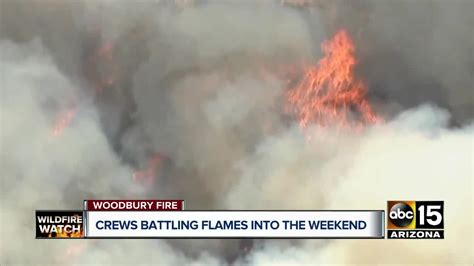Taken out my upstairs window, the fire was six miles from our house on the top of the. 'Woodbury Fire' continues to burn in Superstition Mountains