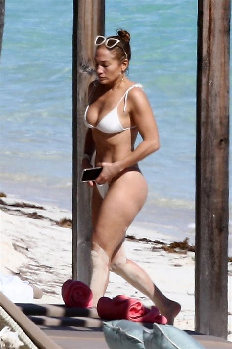 Jennifer Lopez Flaunts Her Famous Curves In A White Bikini While At The Beach In Turks And