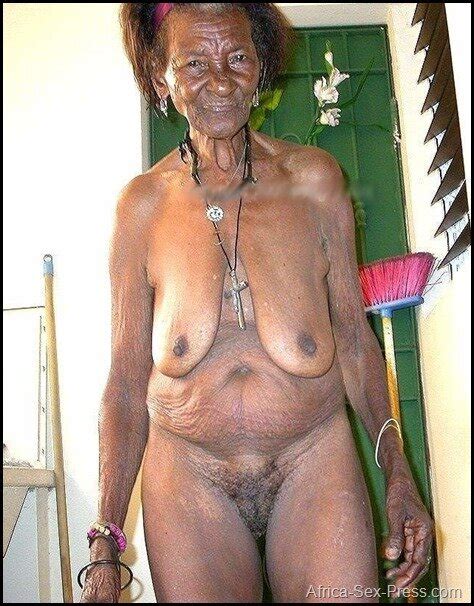 Very Old African Granny On Her Shabby Apartament Blue64