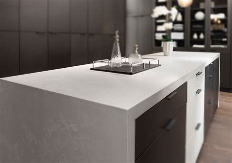 Flawless Master Closet Featuring Caesarstone Cloudburst Concrete The