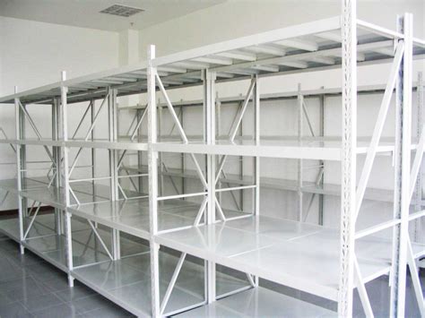 The roofing panels are laid in a vertical orientation starting from the peak and ending at the eaves/sides. Metal Garage Shelves - Decor Ideas