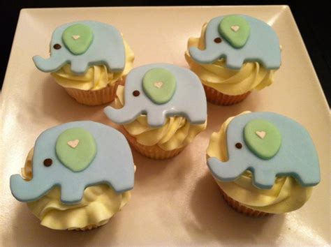 Draw your elephant shape onto tracing paper, fill in with cupcakes and then stick with fondant. Sweet Treats by Susan: Elephant Baby Shower Treats :)