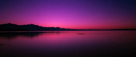 2560x1080 Pink Purple Sunset Near Lake 2560x1080 Resolution Wallpaper