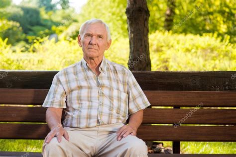 Old Man Sitting On Bench Stock Photo By ©denisfilm 127738240