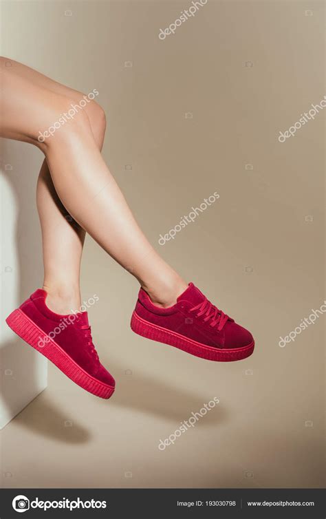 Cropped Image Woman Legs Stylish Sneakers Beige Background Stock Photo