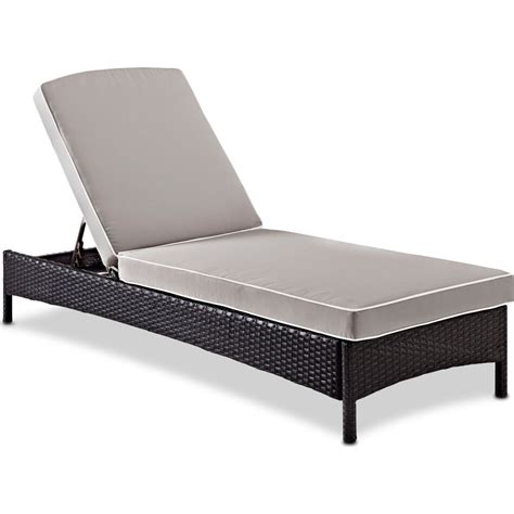 The chaise lounge is like a long sofa with an armrest attached to one side, which makes it comfortable for laying down to read, watch tv or take a nap. Jonah Outdoor Chaise Lounge | Value City Furniture