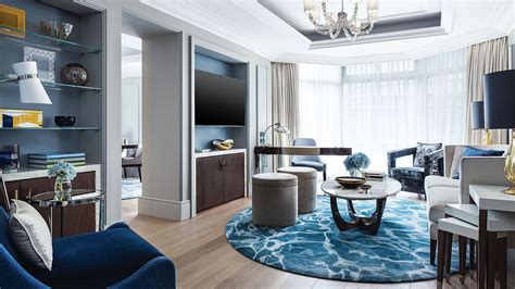In this living room by gail davis design, it suits the warm leather and brass pieces wonderfully, while the blue painted accents cool things off. Harmony Living Room Interior Design 3 - DECORATHING