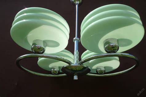 The design elements within art deco heavily influenced many different types of products. Green Art Deco Style Ceiling Light for sale at Pamono