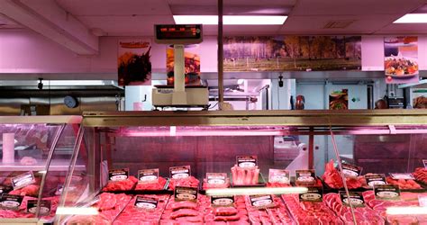 Tasty treasures at the wall of preserved goods at deli cravings. Belconnen Fresh Food Markets: Meat and poultry that's a ...