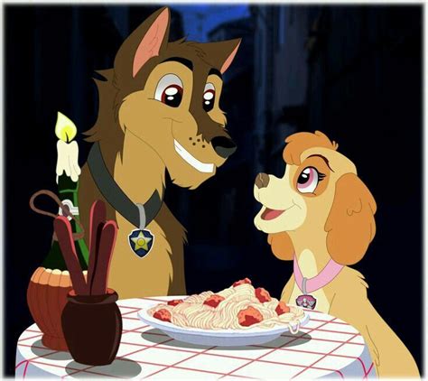 Two Dogs Are Sitting At A Table With Food