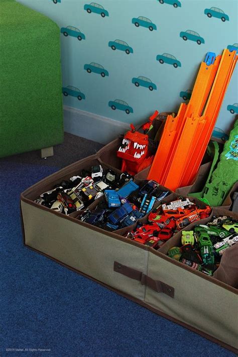I built a wall mount for standard hot wheels tracks to mount to the wall. 15+ Hot Wheels Storage and Organization Ideas | Lures And Lace