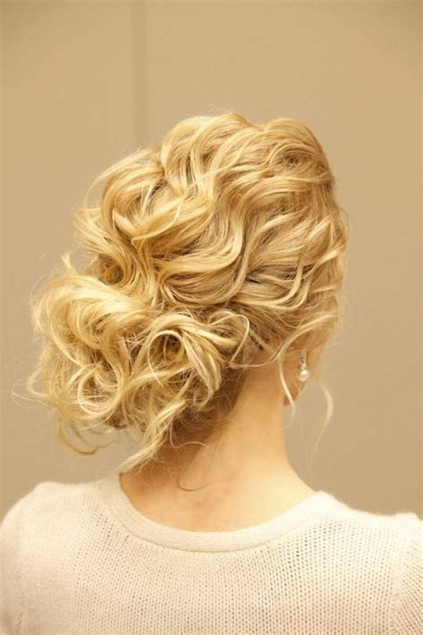 To achieve this look, first part your hair to one side slightly and divide it into two. Untamed Tresses | Naturally curly wedding hairstyles