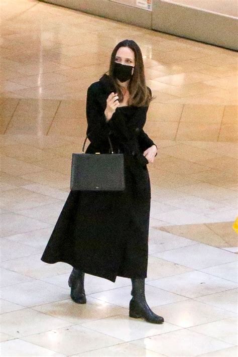 Latest update by angelina jolie ❤ fan account dm for promotion shop now bit.ly/freegreenstick. ANGELINA JOLIE Out Shopping in Los Angeles 02/06/2021 ...