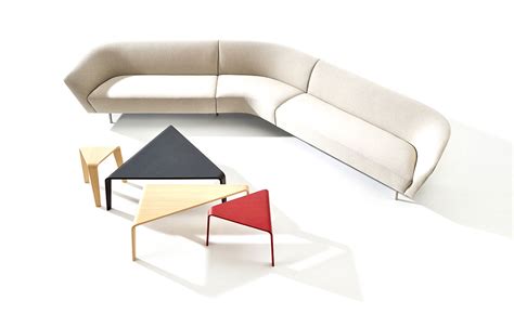 This balance of sculptural form and everyday function makes the triangle coffee table an understated and beautiful element in homes and offices. Ply Triangular Coffee Table - hivemodern.com