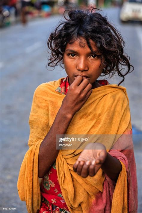Poor Indian Girl Asking For Help High Res Stock Photo Getty Images