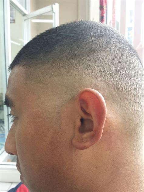 The fade haircut has catered to men with short hair, but these days guys have been combining a low or high fade with medium or long hair on top. His really bad fade - Yelp