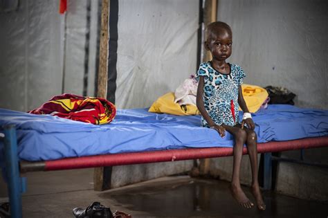 Photographer Sebastian Rich Documents Starving Sudan Girl Brought Back