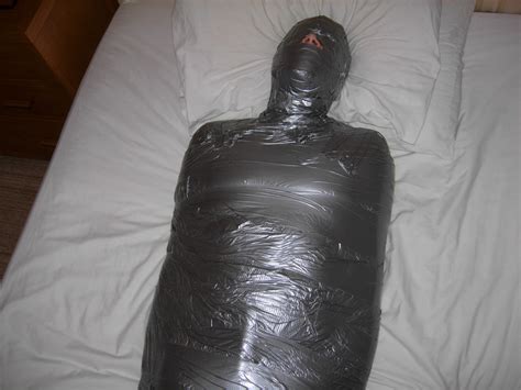 mummified in duct tape by rodse on deviantart