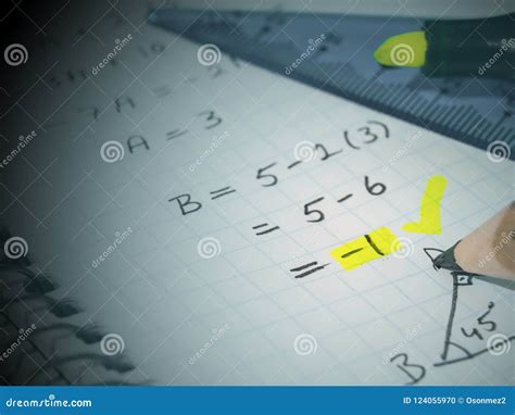 Square Mathematics Student Book And Colored Pencil On It Stock Photo