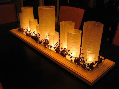 Candles….oh they look lovely in any form or shape and can illuminate your dining tables as centerpieces!candles can either be grouped together and lit up when needed, or you can place single candelabra to add more style to your dining experience. Frugal Home Design: Beautiful Candle Centerpieces