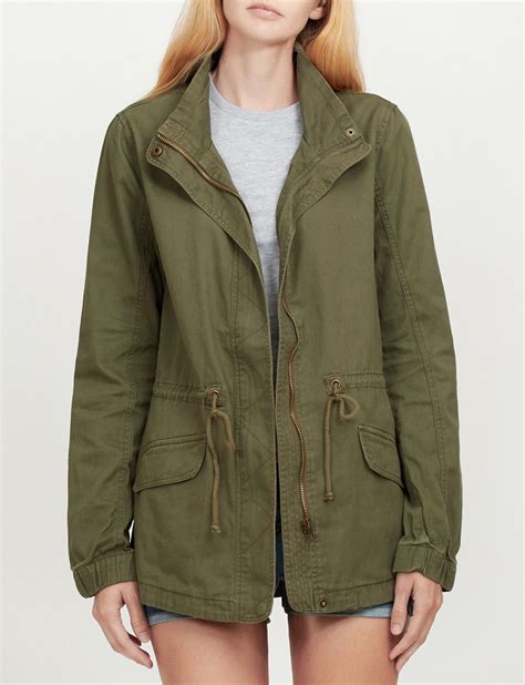 Take Over In This Military Anorak Jacket Featuring A Drawstring Waist