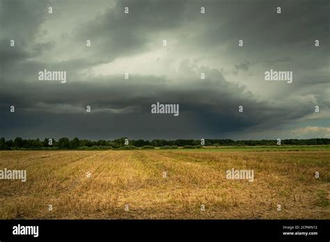 Dark Stormy Cloud Over The Field Summer Day Stock Photo Alamy