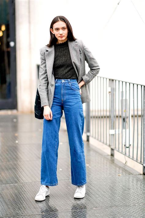 13 outfits that prove high waisted jeans are eternally chic pantaloni a vita alta