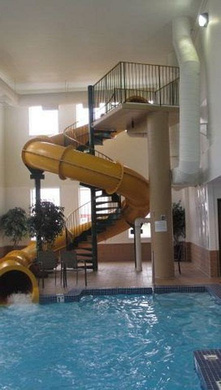 20 Awesome Indoor Swimming Pool Designs With Slide Indoor Swimming