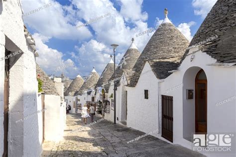 View Of The Typical Trulli Huts And The Alleys Of The Old Village Of