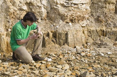 Young Geologist Studying Rock Type Stock Photo Image Of Person Sand