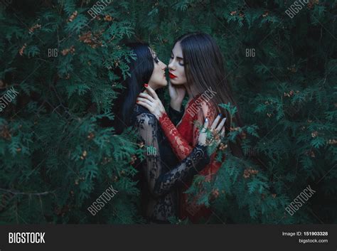 two women hugging image and photo free trial bigstock