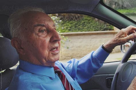 85 Year Old Healthy Man Driving His Car By Stocksy Contributor Per