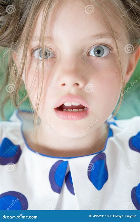 Ten Year Old Girl Sobs At The Window In The Room Royalty Free Stock