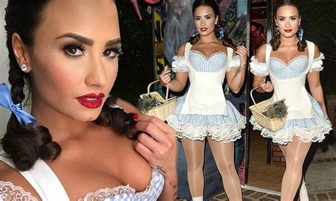 Demi Lovato Dresses Up As A Very Busty Dorothy Gale For Halloween