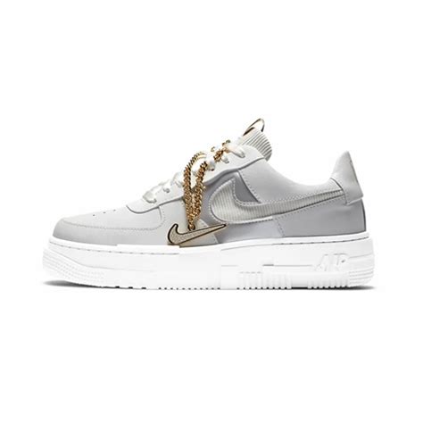Arriving in a modern style, the shoe features glitchy tweaks and distorted dimensions. NIKE WMNS AIR FORCE 1 PIXEL - GOLD CHAIN - AVAILABLE NOW ...