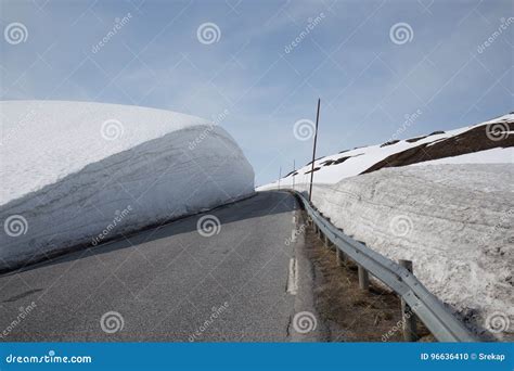 High Snow Wall Along A Mountain Pass Road Vikafjellet Stock Photo
