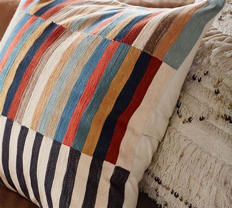 The other day i was browsing through my mother's button box when i came across these beauties: Carson Crewel Stripe Pillow Cover | Pottery Barn