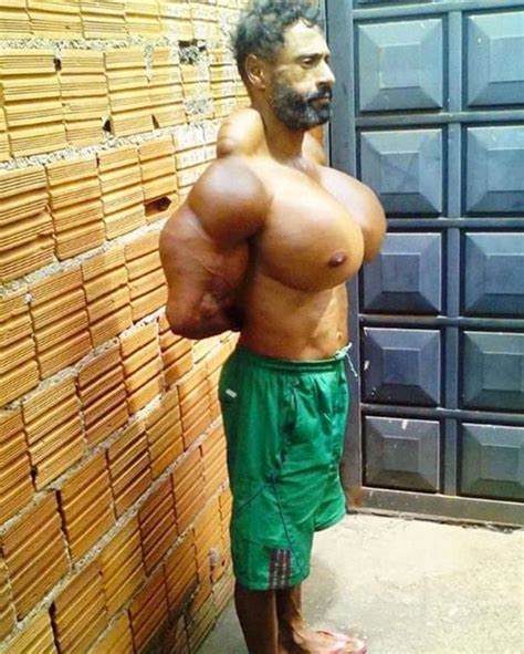 Bodybuilder Dubbed The Monster Injects Himself With Oil To Boost 23