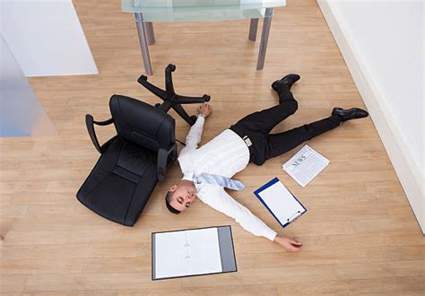Falling Off Office Chair Stock Photos Pictures And Royalty Free Images
