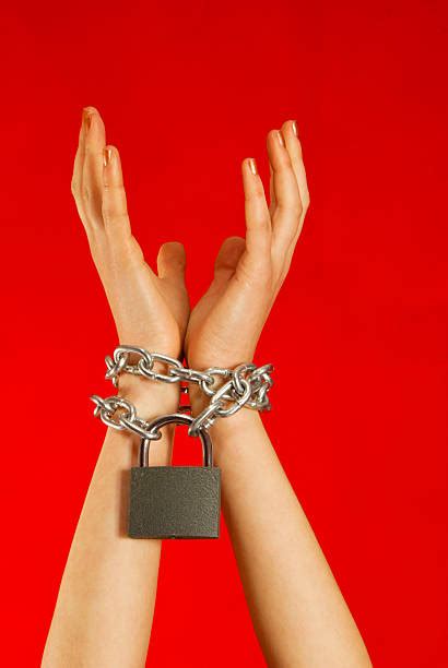 Best Woman Hands Tied Up With Chain Stock Photos Pictures And Royalty
